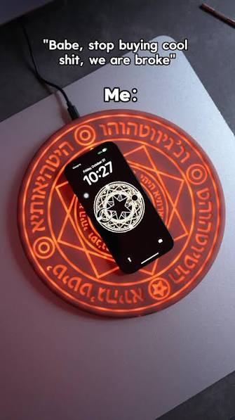 MYSTARA Arc Charger photographed vertically with a phone charging